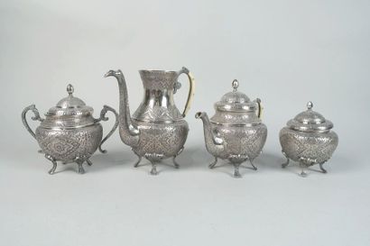 null IRAN 
Four-piece silver tea and coffee set
Height 15 cm; 15 cm; 17 cm; 19 cm
Gross...