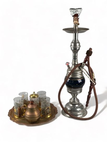 null Set including a copper hot water fountain, a narghileh, a tray and tea glasses.
Fountain...
