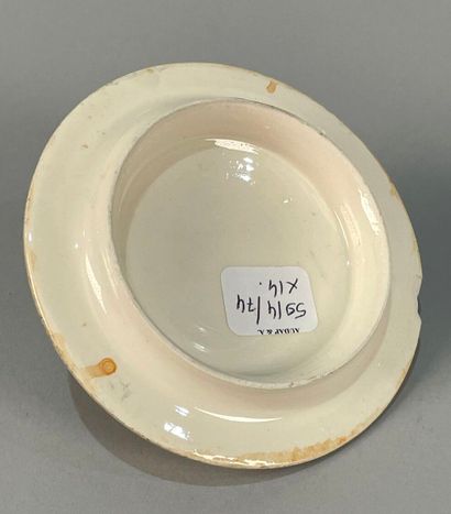 null VALLAURIS 
Polychrome ceramic service including a sugar bowl, a milk jug, six...