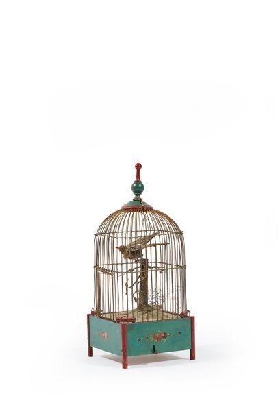 null Oiseau automate dans une cage boîte formant boîte à musique, la caisse en bois...