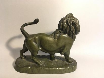null MASSON Jules-Edmond (1871-1932), d'après
" Lion marchant "
Régule à patine verte,...