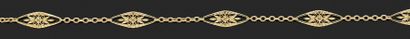 null Collier articulé en or jaune 750 millièmes, les maillons décorés de motifs losangiques...