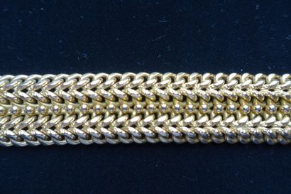 null Bracelet articulé en or jaune 750 millièmes, les maillons entrelacés, décoré...