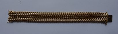 null Bracelet articulé en or jaune 750 millièmes, les maillons entrelacés, décoré...
