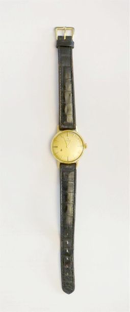 null MOVADO.
Montre bracelet de dame, la montre de forme ronde en or jaune 750 millièmes,...