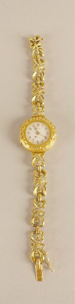 null Montre bracelet de dame, en or jaune 750 millièmes, la montre de forme ronde,...