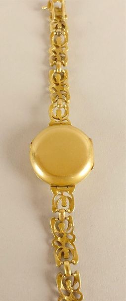 null Montre bracelet de dame, en or jaune 750 millièmes, la montre de forme ronde,...