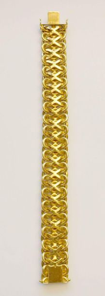 null Bracelet articulé en or jaune 750 millièmes, les maillons imbriqués en forme...