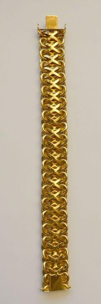 null Bracelet articulé en or jaune 750 millièmes, les maillons imbriqués en forme...