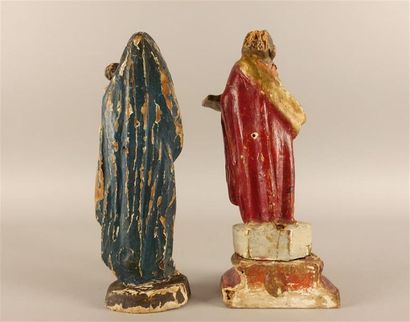 null Vierge à l'enfant et Saint personnage 
Deux petits sujets en bois sculpté polychromé.
Haut....