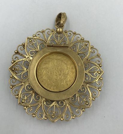 Pièce de 20 Francs or Napoléon III dans un pendentif en or jaune 18 K (750 millièmes)...