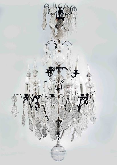 null 
A large chandelier with pendants on two levels, bronze frame; glass and crystal...