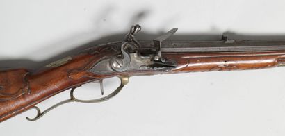 null 
Flintlock hunting rifle, octagonal barrel slightly blunderbussed, with facet...