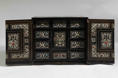 null 
Black stained wood cabinet with two doors revealing drawers
Inlaid with bone...
