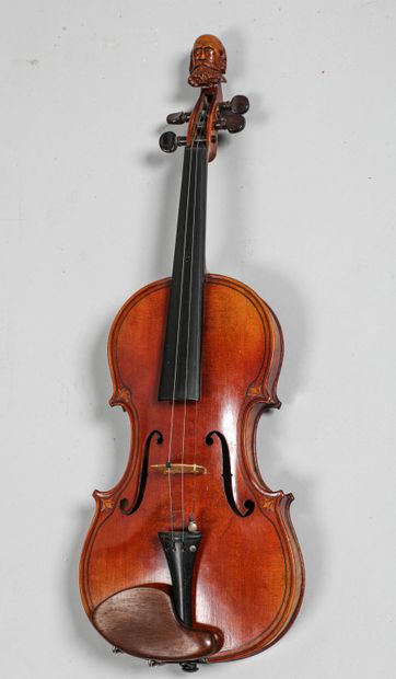 null 
Violin with case and bow
Neck carved with an old man's head, marquetry on the...