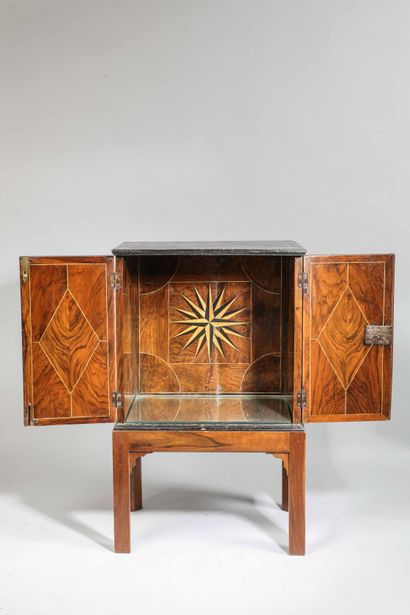 null 
Small oak and veneer inlaid chest. It opens with two doors revealing an interior...
