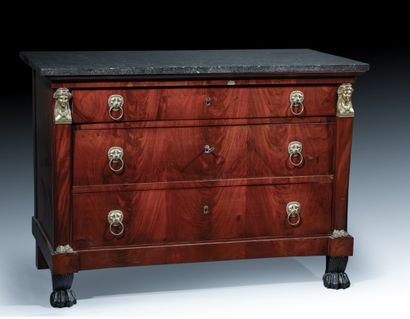 null 
A mahogany and mahogany veneer Directoire chest of drawers opening with three...