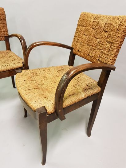 Paire de fauteuils en bois laqué attribués à Houdoux, dossier et assise en cordage...