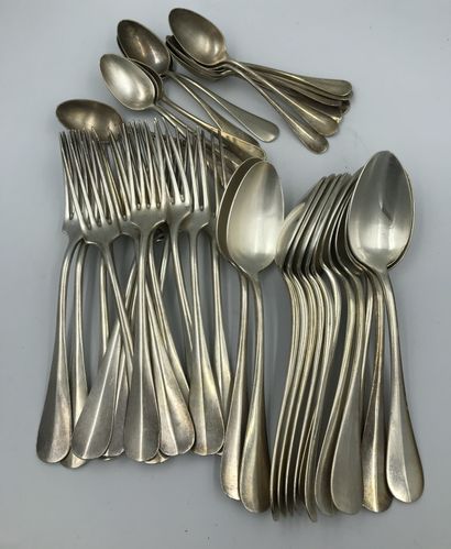 null A silver-plated metal household set, baguette model, including : twelve cutlery...
