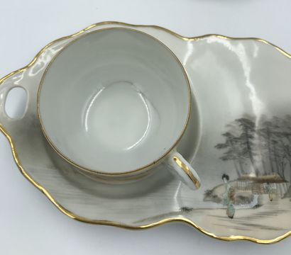 null Two porcelain service pieces, one of which is a you-and-me service and the other...
