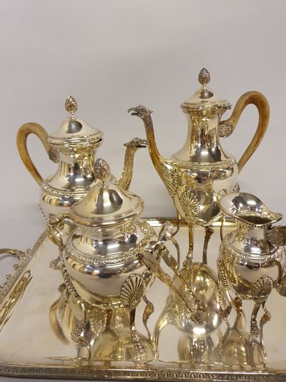 null 
4 piece silver plated tea/coffee set with shell decoration





A serving tray...