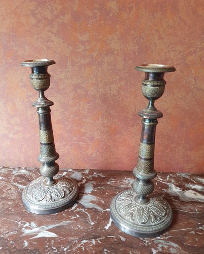 null 
Pair of candlesticks with two silver plated arms, decorated with garlands hanging...