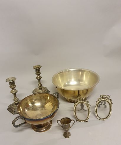 null 
*Lot of silver plated metal: pair of candlesticks with cut sides; two miniature...