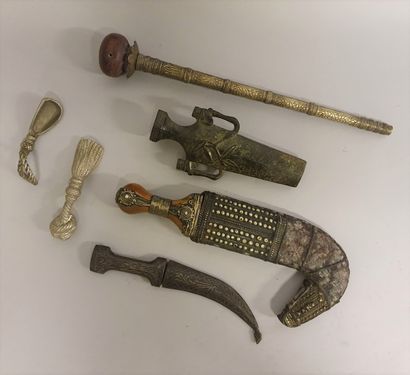 null Lot of oriental daggers; drum cane (?); spoon and knotted bottle opener (?);...