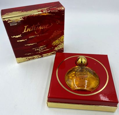 CARVEN " Intrigue " CARVEN "Intrigue 

Glass bottle, titled on one side " Intrigue...
