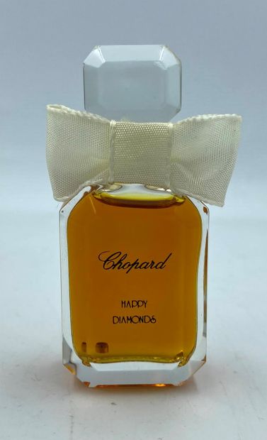 CHOPARD " Happy Diamonds " CHOPARD "Happy Diamonds 

Glass bottle, titled. White...