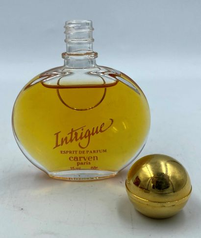 CARVEN " Intrigue " CARVEN "Intrigue 

Glass bottle, titled on one side " Intrigue...