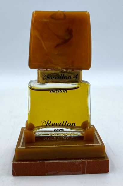 REVILLON " Revillon 4 " REVILLON "Revillon 4 

Glass bottle, titled. Golden neck....