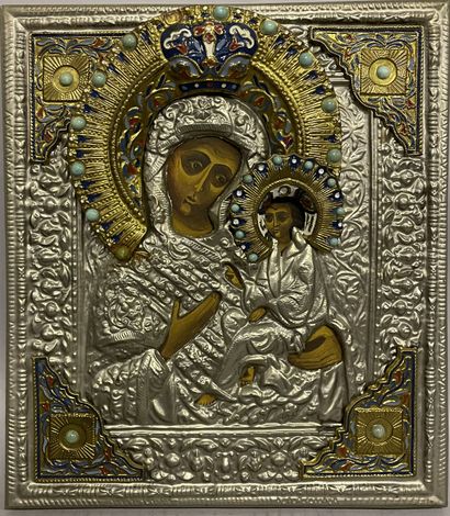 ICONE moderne figurant une Vierge à l'Enfant avec un oklad en métal émaillé ICONE...