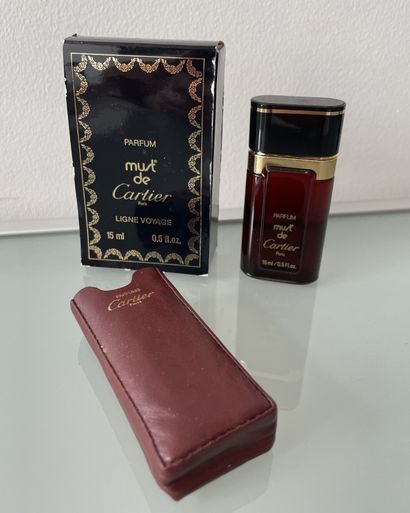 null CARTIER " Must "



Glass travel bottle with its red leather case, titled Parfums...