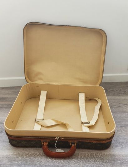 null LOUIS VUITTON



Small "Stratos" suitcase, semi rigid, in monogram canvas and...