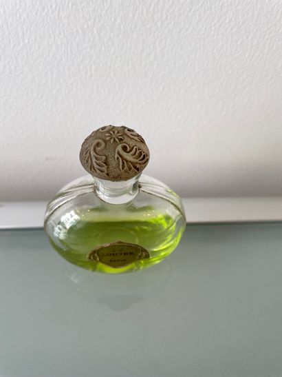 null LOUVRE STORE



Glass bottle, round shape, label titled "Au Louvre Paris".



Stopper...
