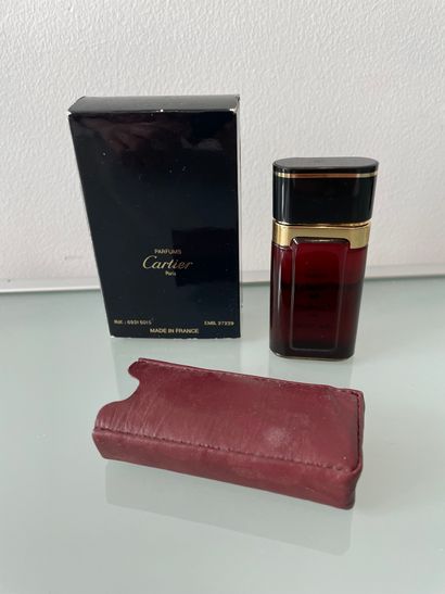 null CARTIER " Must "



Glass travel bottle with its red leather case, titled Parfums...