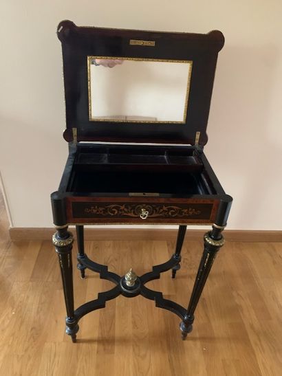Travailleuse Small dressing table in veneer and black tinted wood, the top opening...