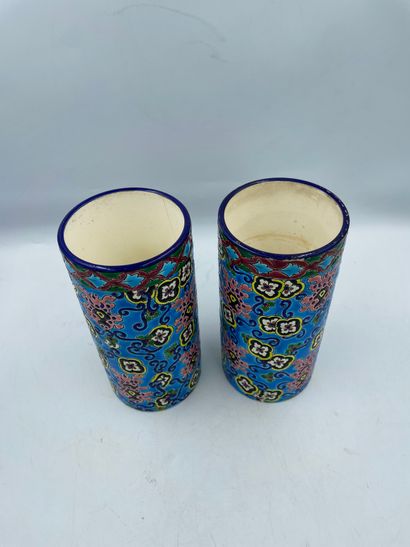 LONGWY 
LONGWY




TWO polychrome earthenware cylindrical VESSELS with floral decoration...