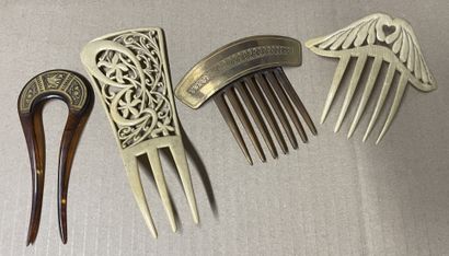 null TWO PLASTIC HAIR COMBS imitating ivory with openwork gold in the Art Nouveau...