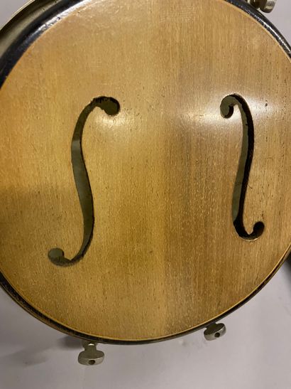 INSTRUMENT Stringed instrument in wood, skin and metal with violin decoration on...