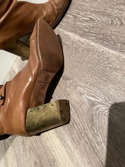 Sonia RYKIEL Sonia RYKIEL

PAIR OF CAMEL BOOTS with buttoned strap and gold metal...