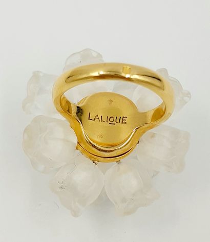 LALIQUE LALIQUE

Ring model "Muguet" in gilt metal and twelve lily of the valley...