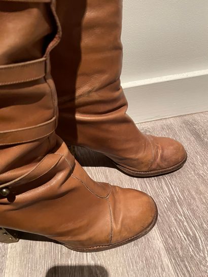 Sonia RYKIEL Sonia RYKIEL

PAIR OF CAMEL BOOTS with buttoned strap and gold metal...