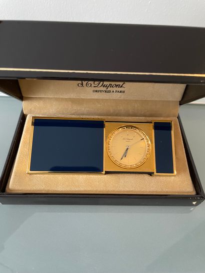 ST DUPONT ST DUPONT

LITTLE TRAVELLING CLOCK in gold plated and blue enamel, simulating...