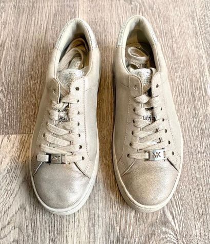 Michael KORS Michael KORS

TWO PAIRS of leather and white nubuck sneakers, one with...