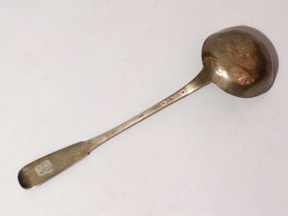 Louche en argent. Paris, 1819-1838. Modèle uniplat, la spatule gravée du monogramme...
