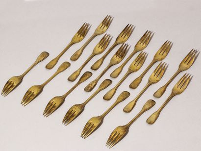 PUIFORCAT, PARIS PUIFORCAT, PARIS
Series of seventeen gilt silver cake forks. Paris,...