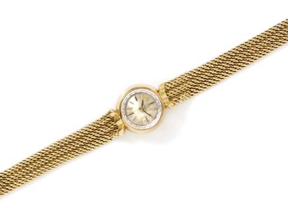 OMÉGA OMEGA
Lady's wristwatch in gold 750 thousandths, silvered dial stained with...