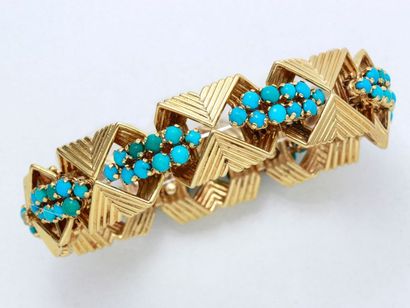 Élégant bracelet articulé en or 750 millièmes composé de maillons stylisé à décor...